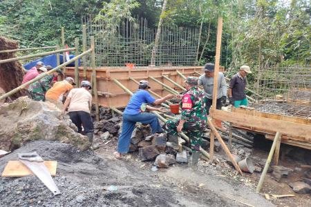 PEMBANGUNAN JEMBATAN GANTUNG DI KA